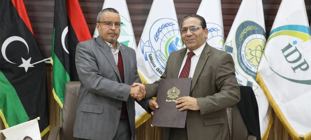 توقيع اتفاقية تعاون علمي بين جامعتي المرقب وسبها